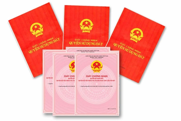 Close-up photo of a pink book with a red seal - pink book apartment - official certification