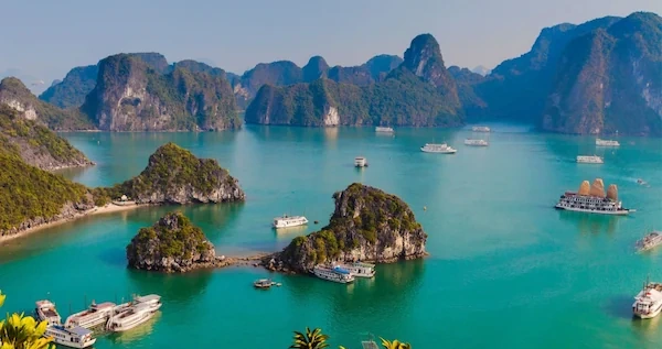 Ha Long Bay - limestone rock formation at sunrise - ethereal beauty