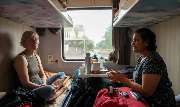 foreign-tourists-train-window-view