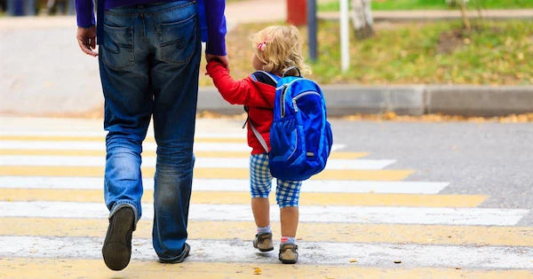 parent-teaching-child-crosswalk-etiquette