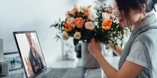 expat-video-chatting-with-partner-laptop