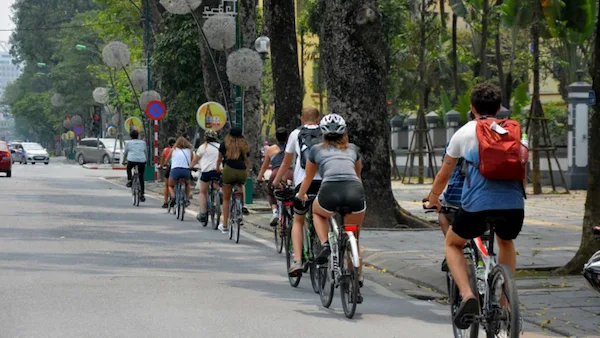 cyclist-riding-through-city-streets