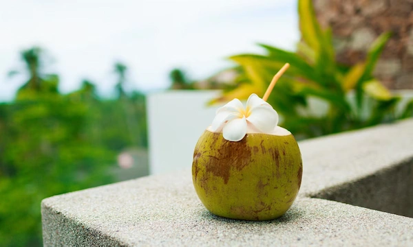 Close-up of glowing, healthy skin - coconut water - natural hydration benefits